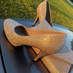 Rose gold shoes with matching clutch